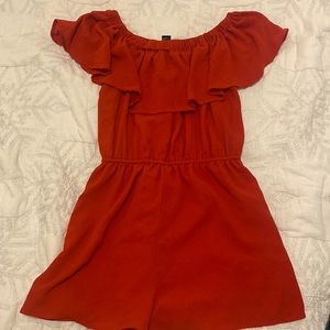 Red romper with ruffle